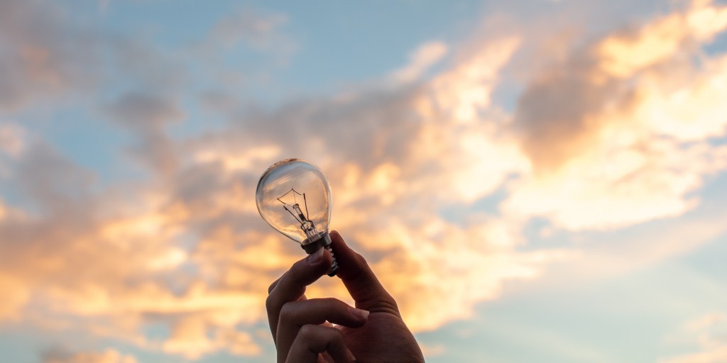 1631273928_person-holding-clear-light-bulb-1314410